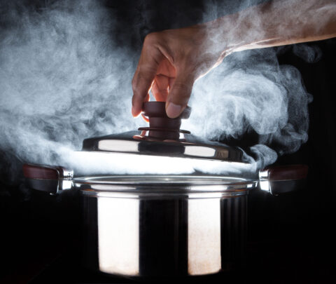 Hand,Of,Chef,Open,Hot,Stream,Pot,With,Beautiful,Studio